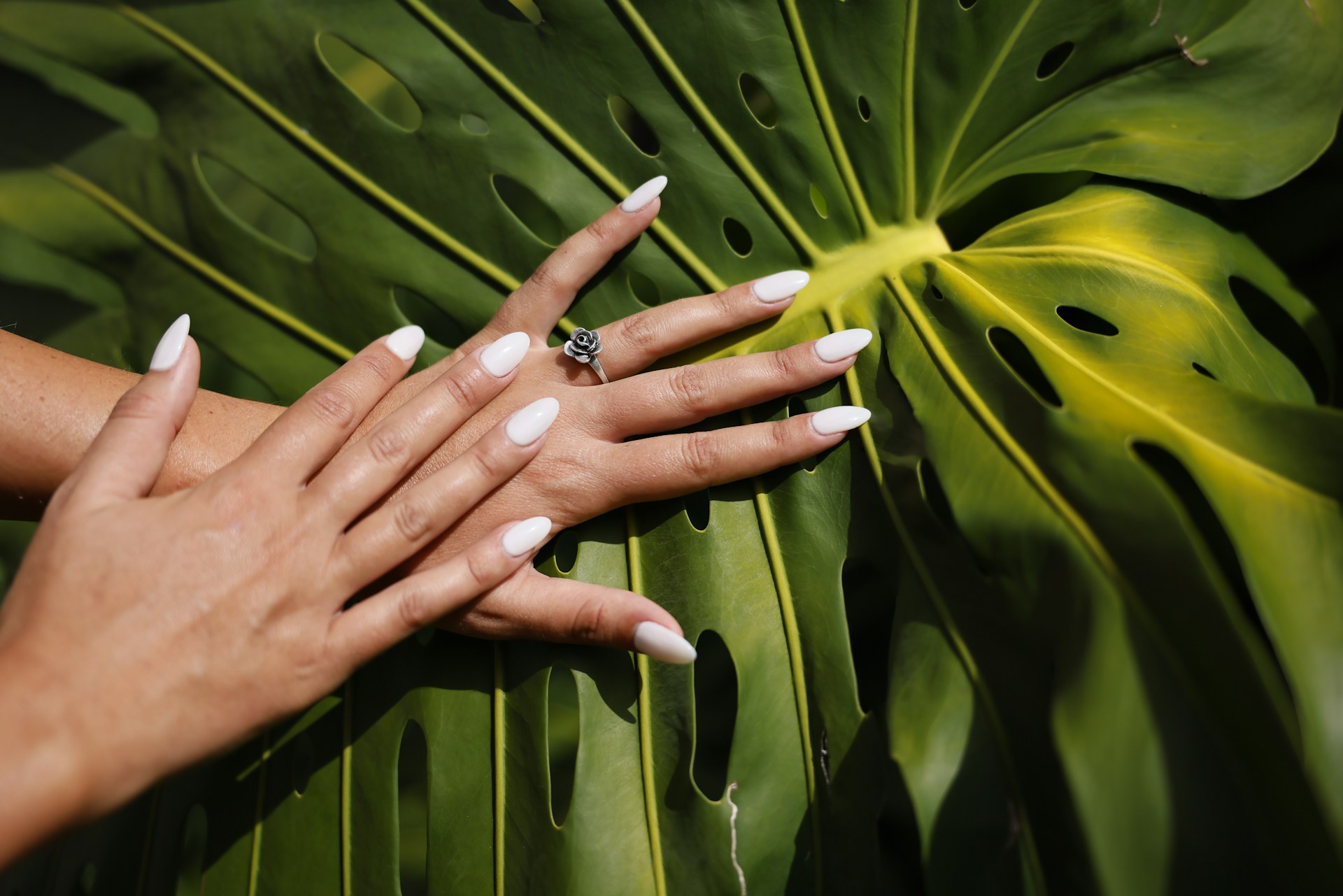 Close-up of natural nails with earthy tones — The Bend Beauty Nook