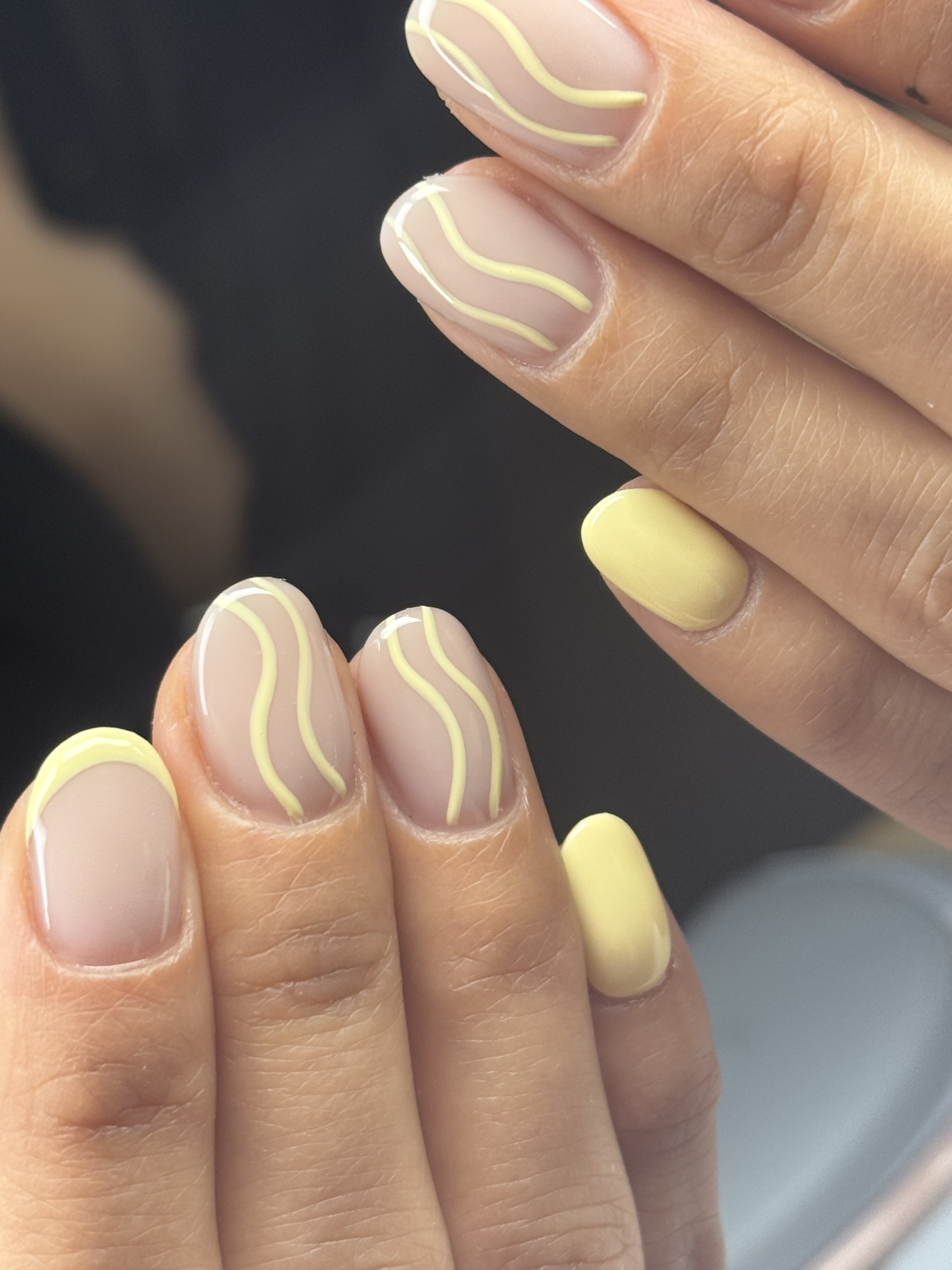 Detailed nail art with intricate hand-painted design