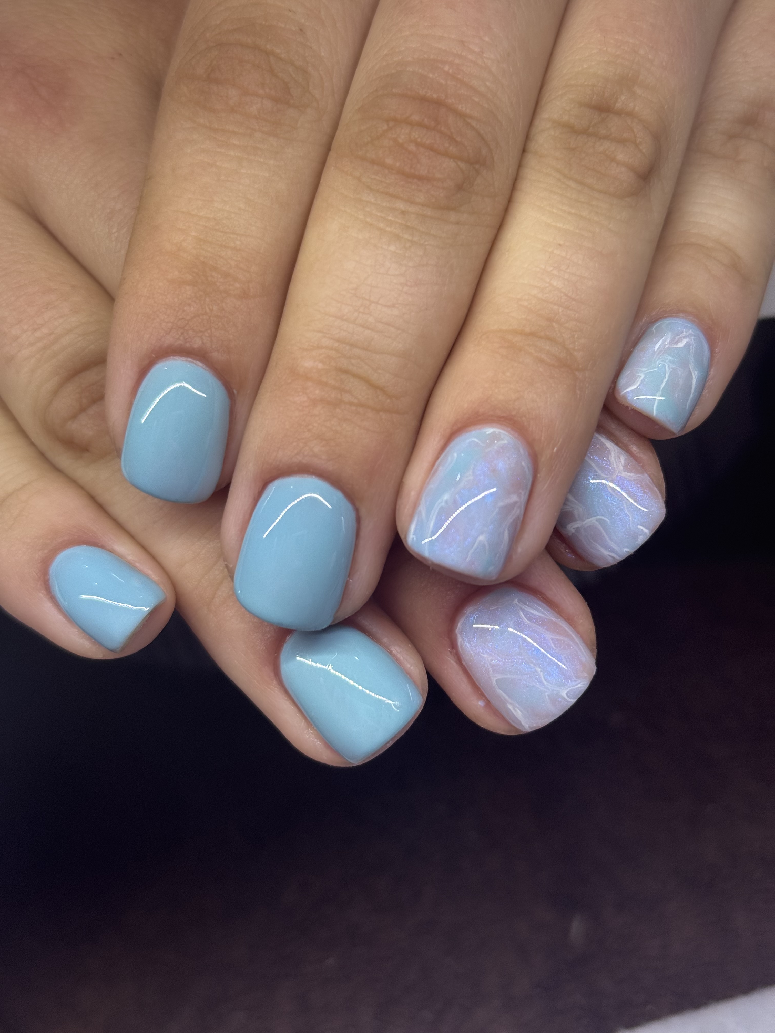 Russian manicure nails with pristine cuticles in a salon setting