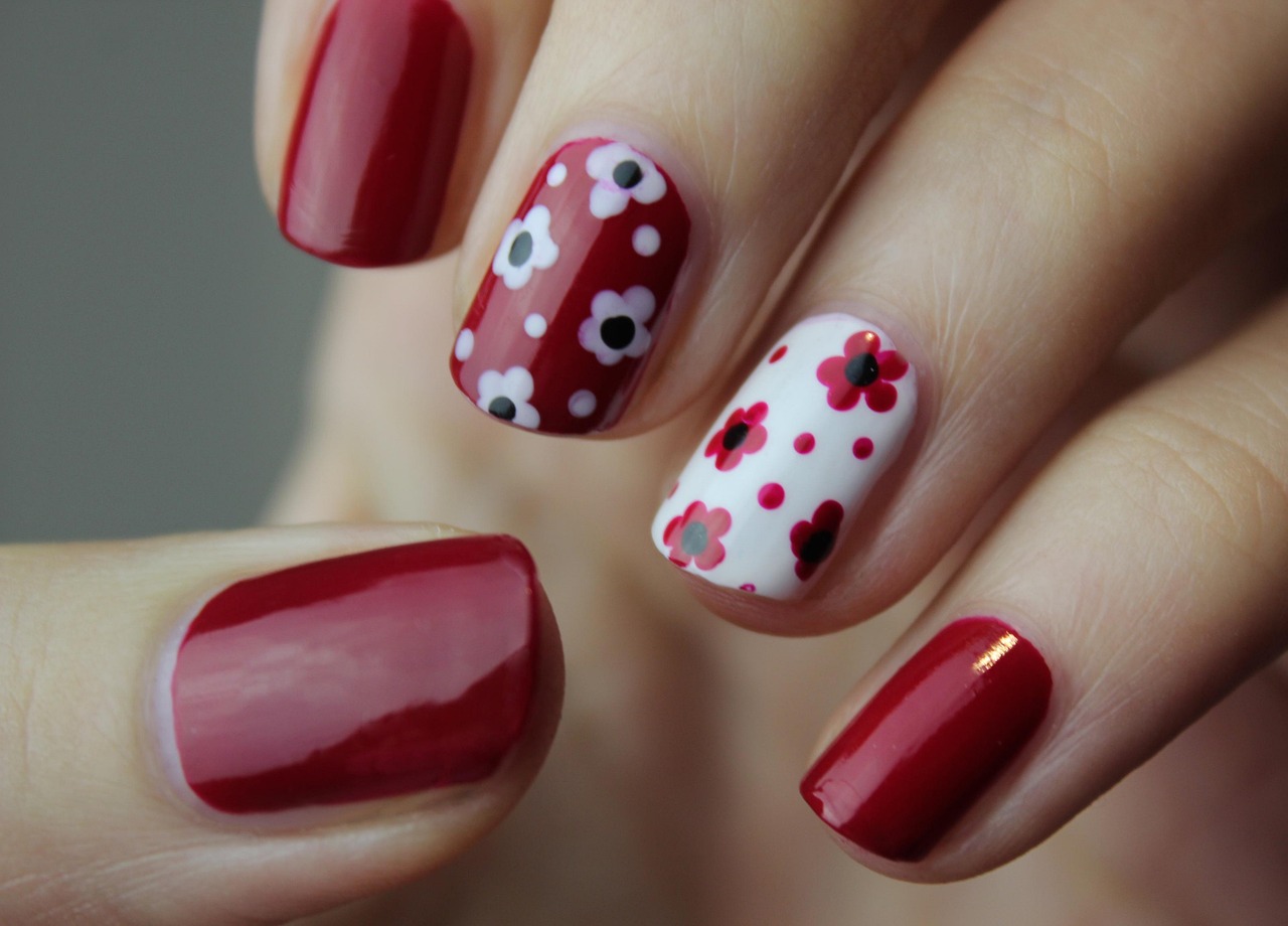 Detailed nail art with intricate hand-painted design