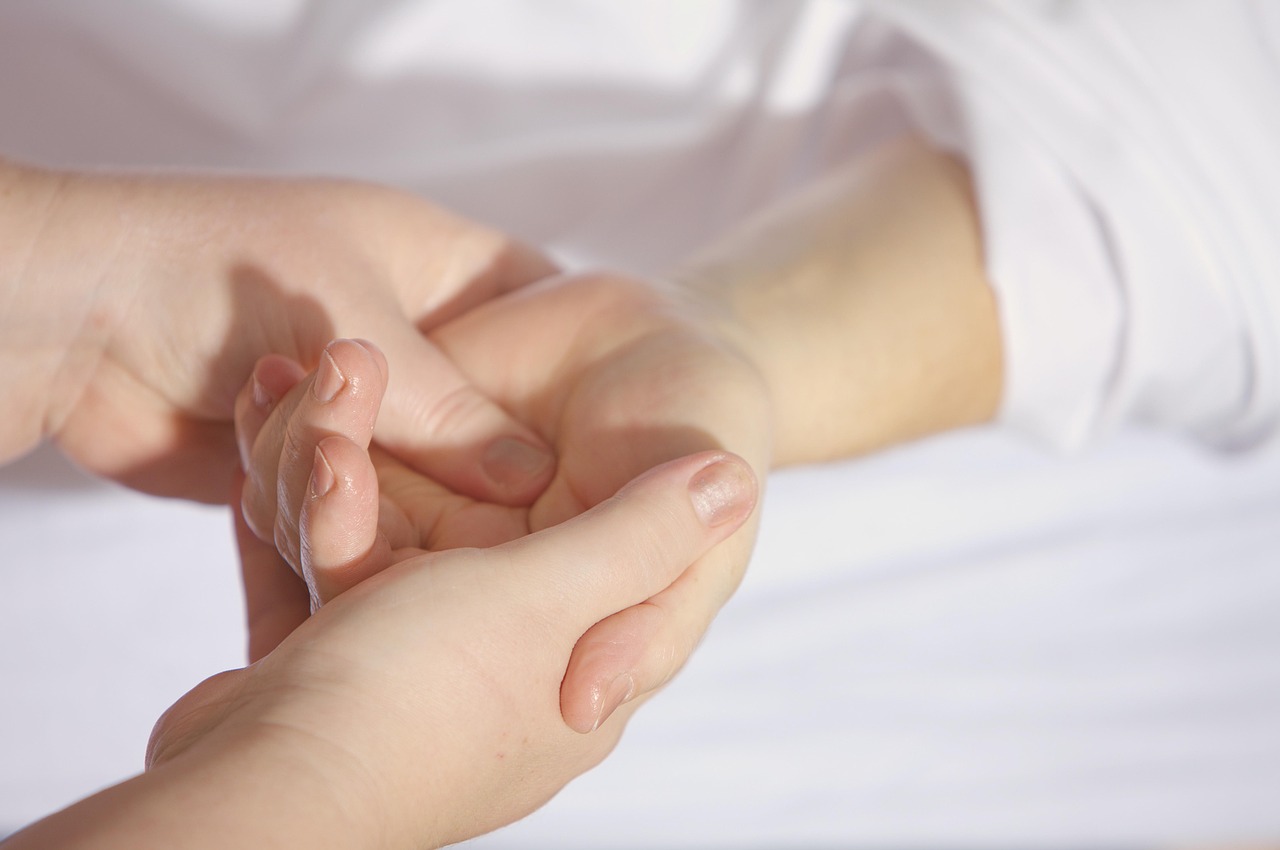 Close-up of therapist's hands during a massage treatment