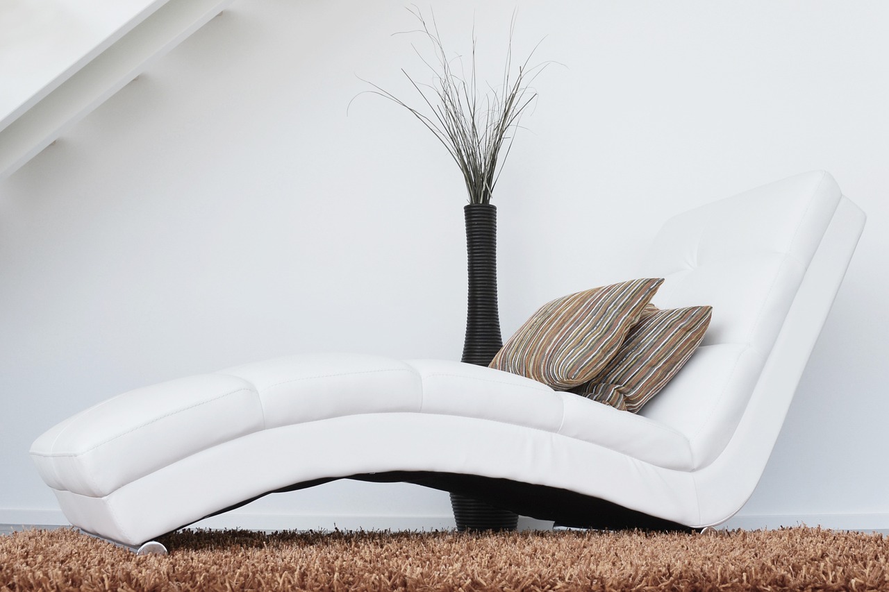 Clean sofa and upholstered furniture in a living room