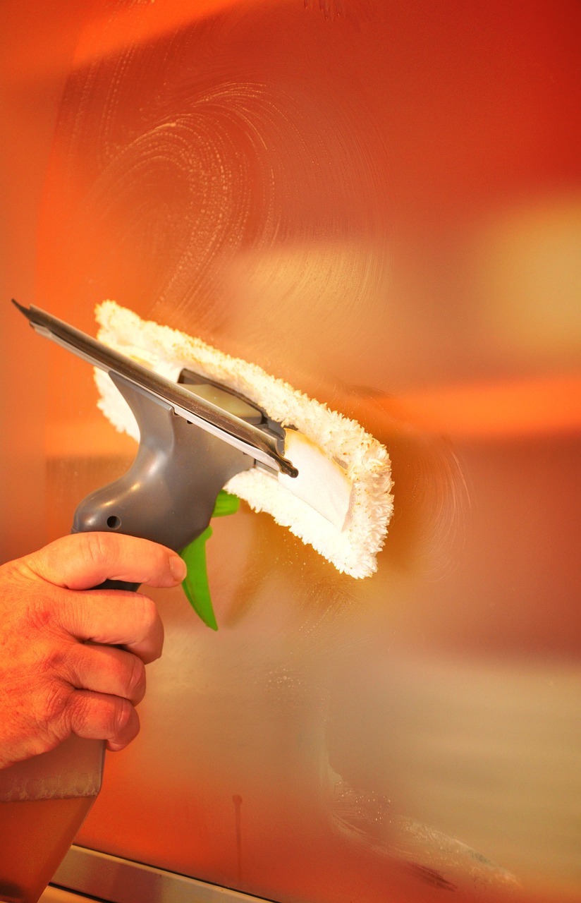 Close-up of a window being professionally cleaned